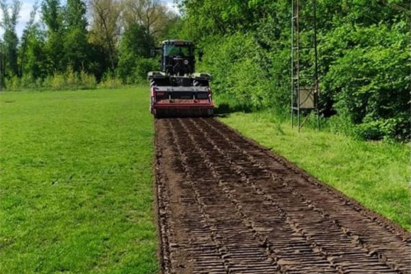 Aanleg kunstgras voetbalveld - Sportinfrabouw NV